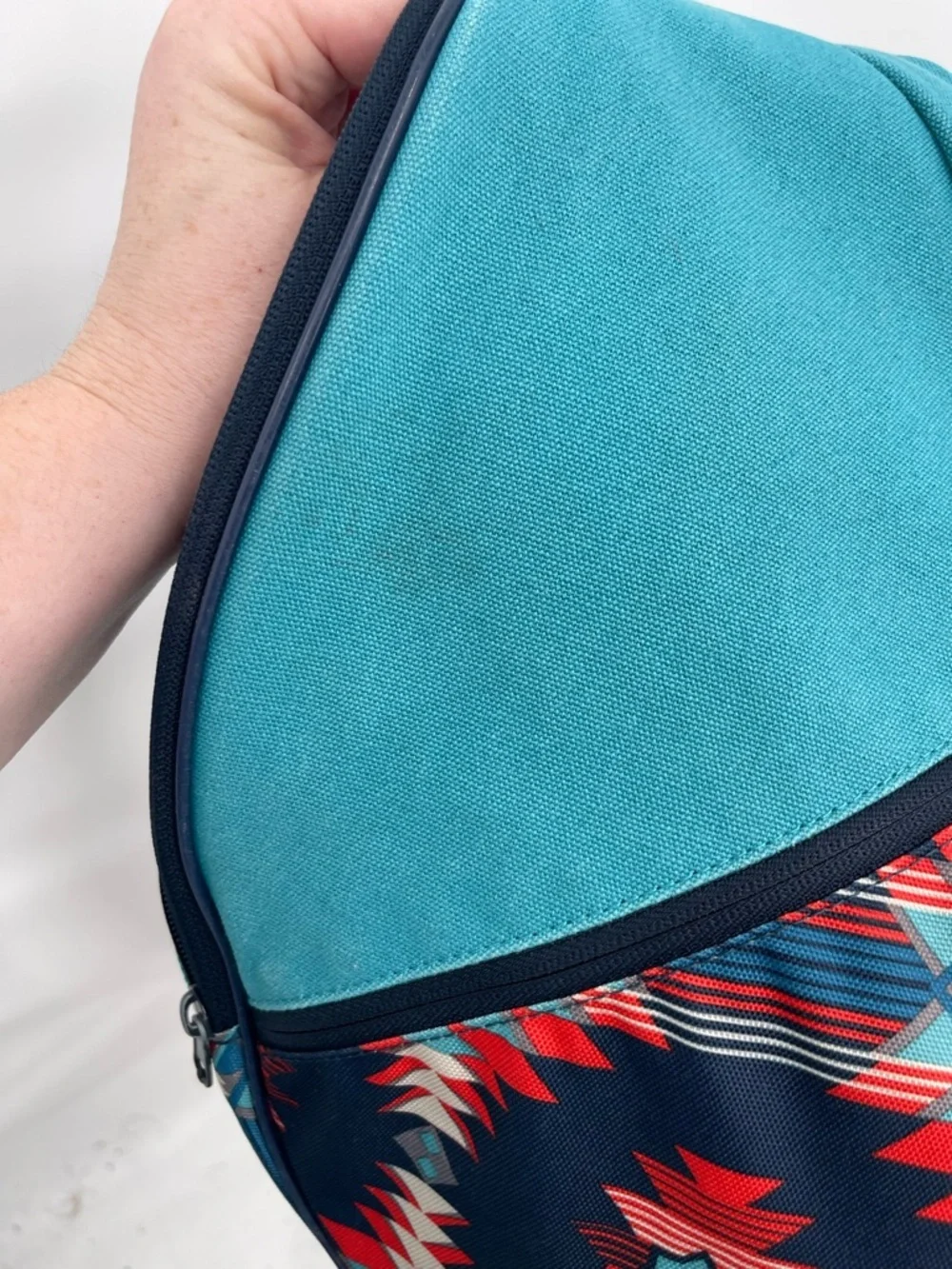 Kavu blue red aztec print sling back bag